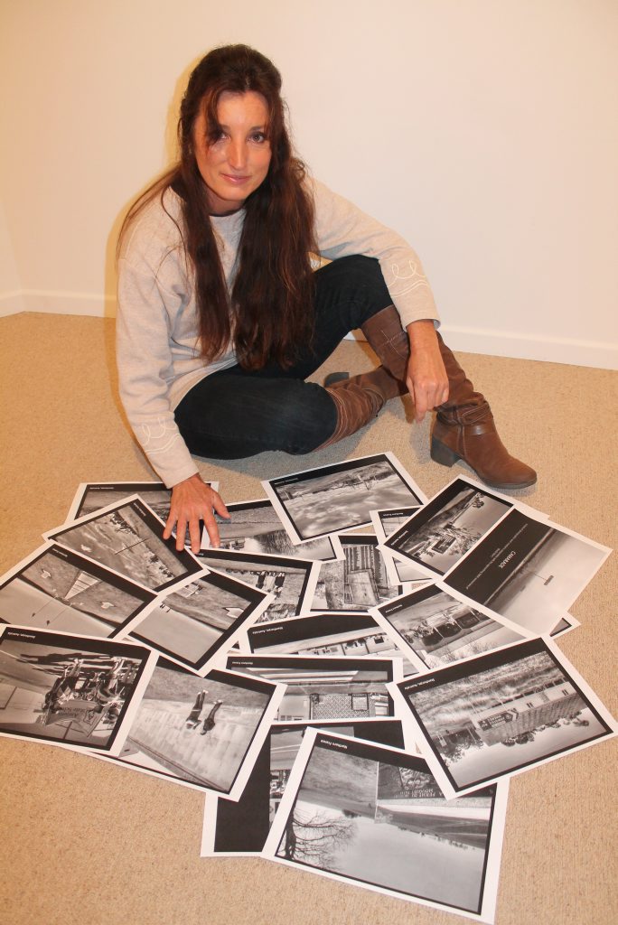 PHOTO HISTORY: Stanthorpe Regional Art Gallery manager Kathleen Davies takes a look through some of the photos already taken by Dr Louise Grayson. PHOTO HISTORY: Stanthorpe Regional Art Gallery manager Kathleen Davies takes a look through some of the photos already taken by Dr Louise Grayson.